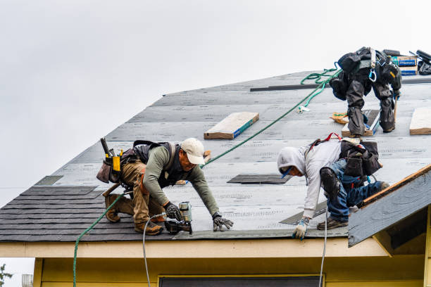 Professional Gutter Installation technician working in Olalla, WA